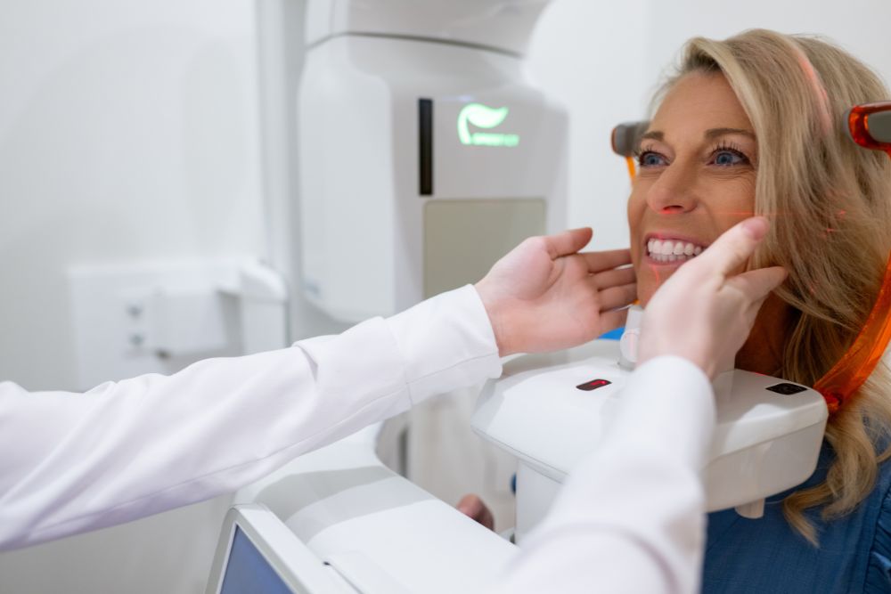 Patient receiving advanced facial and dental imaging for personalized cosmetic dentistry in Naples, FL