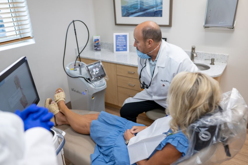 Our Naples, FL dentist prepares advanced laser technology for a patient’s dental treatment