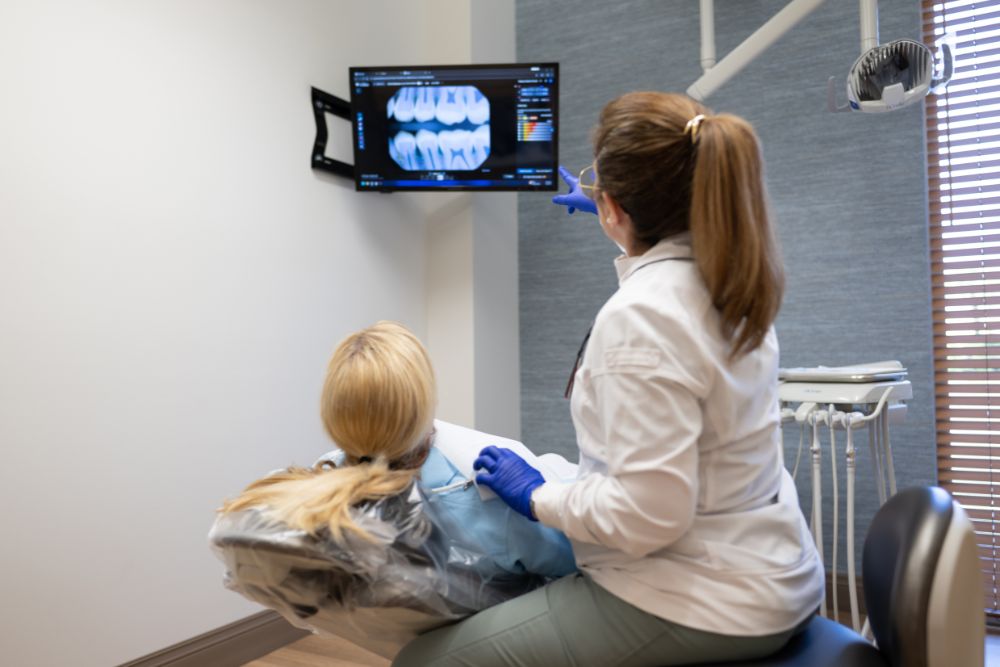 Our Naples, FL dental team reviews digital images while planning a patient’s porcelain veneers